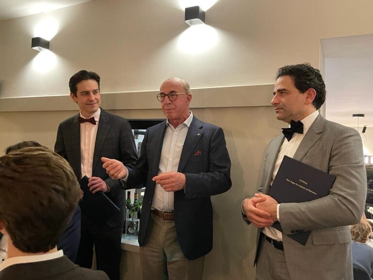 The Future of MAFAC. Bryan Mendelson welcoming new Faculty, Rodrigo Teixeira (Australia, ex Brazil) and Ndje Hambarchian (Germany) after they had been awarded their personal copy of Skoog.