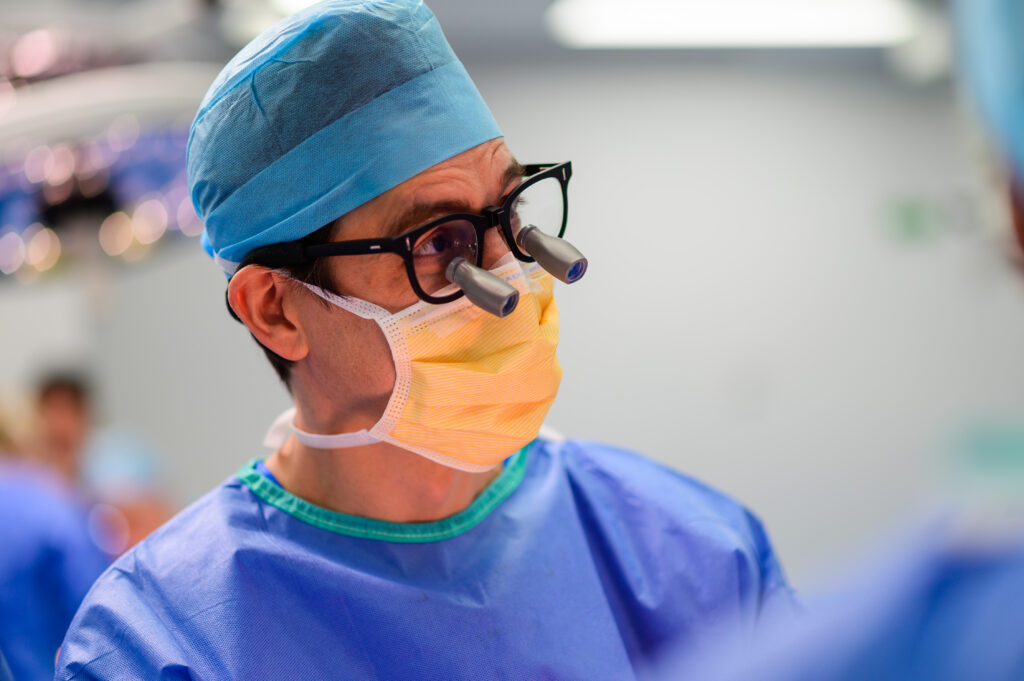 Dr Rodrigo Teixeira specialist plastic surgeon in scrubs