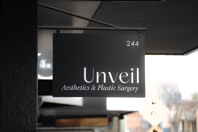 Unveil Aesthetics & Plastic Surgery sign at the Ivanhoe East clinic